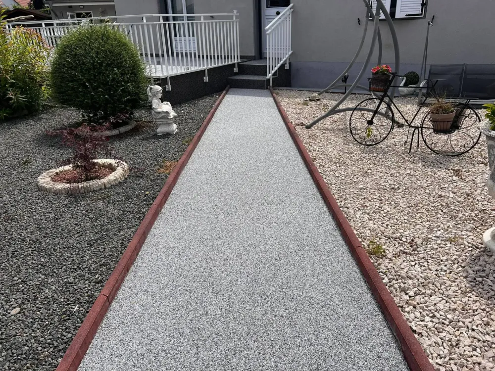 pose de tapis de pierre