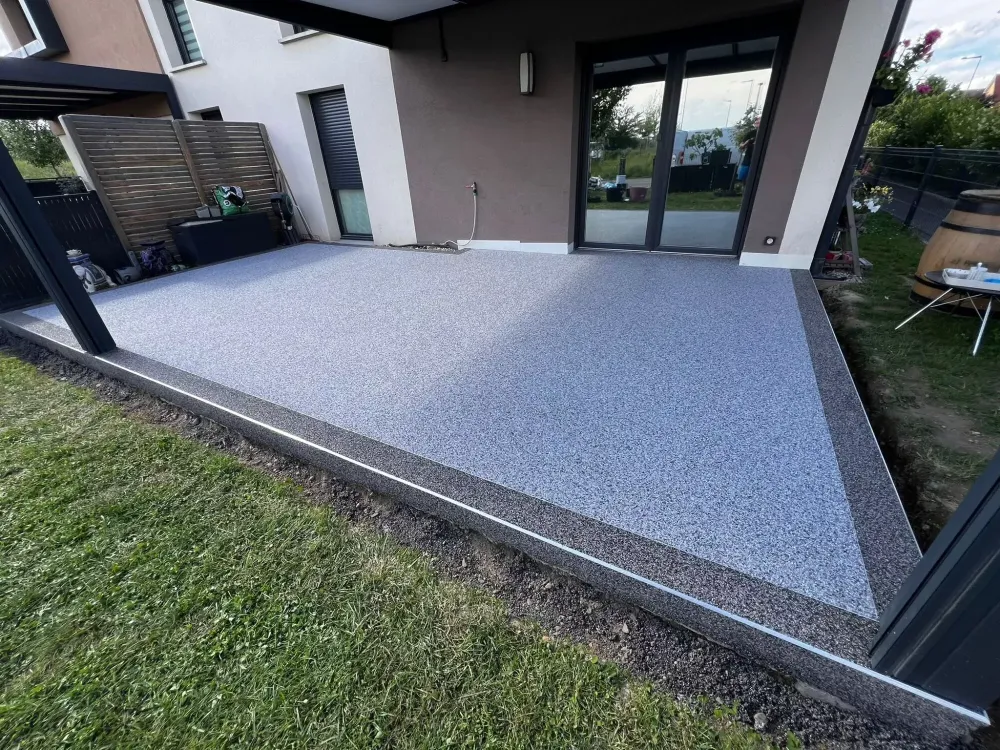 pose de tapis de pierre